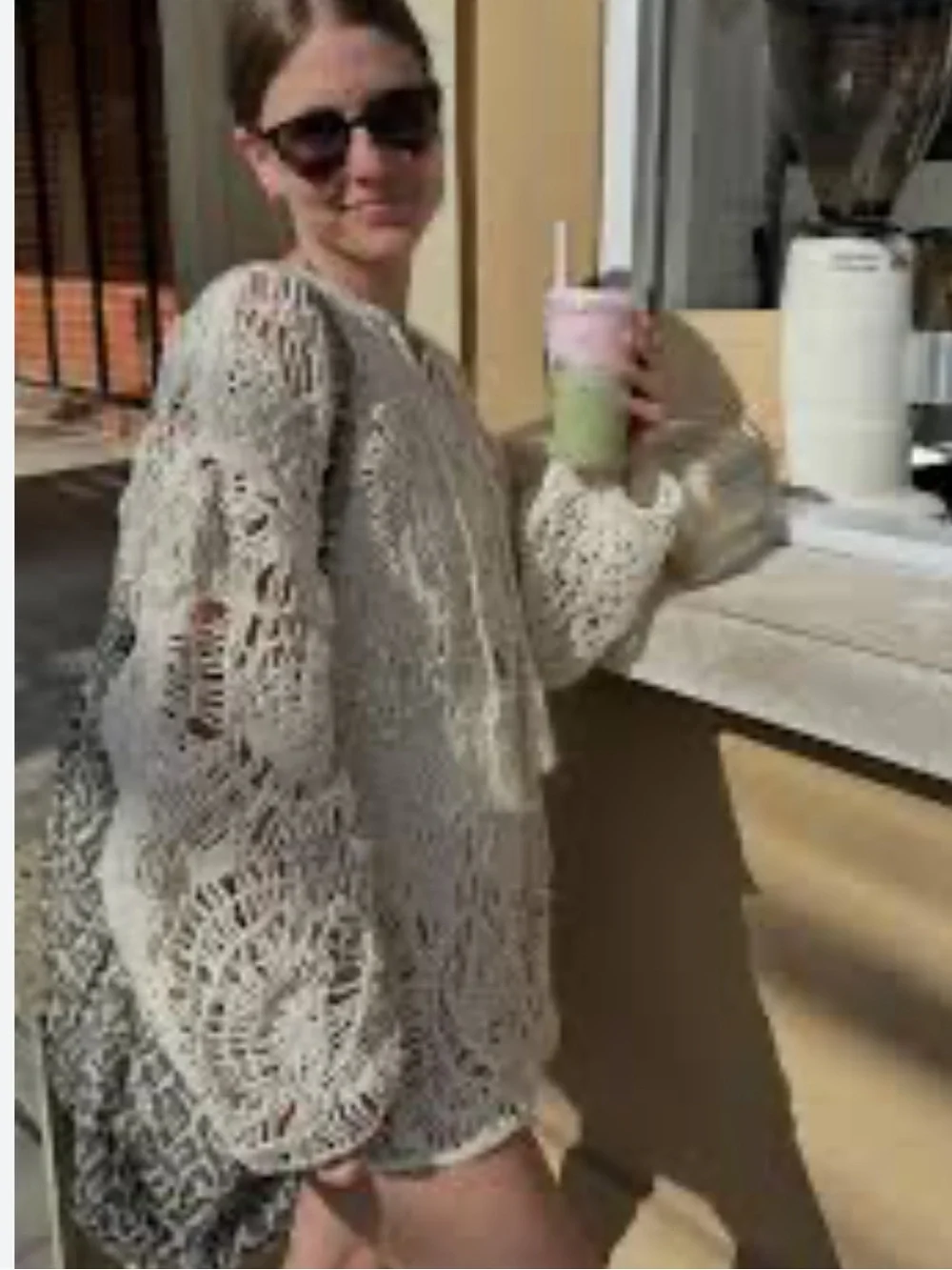Zara Open-Knit Tassel Dress in Ecru features a distinct crochet pattern